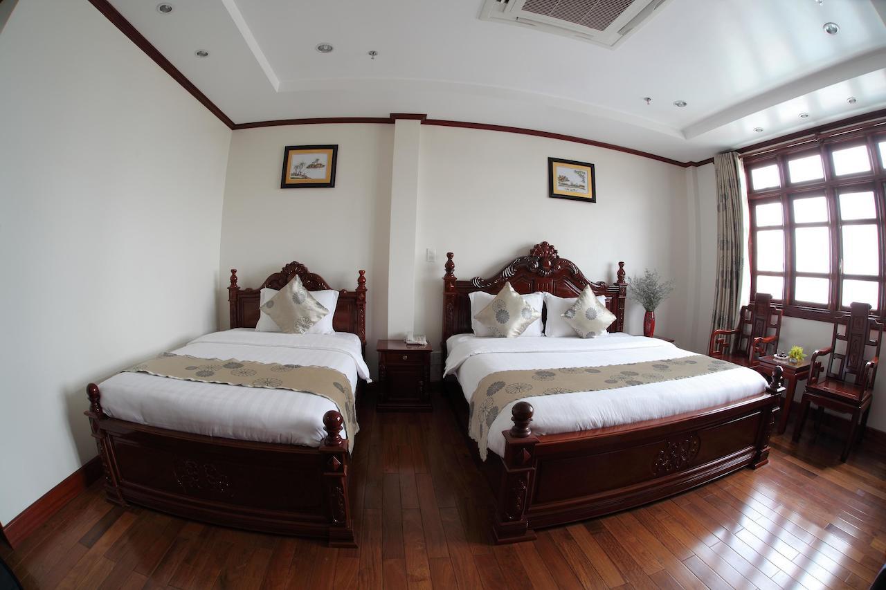 Hotel Kally Saigon Cidade de Ho Chi Minh Quarto foto